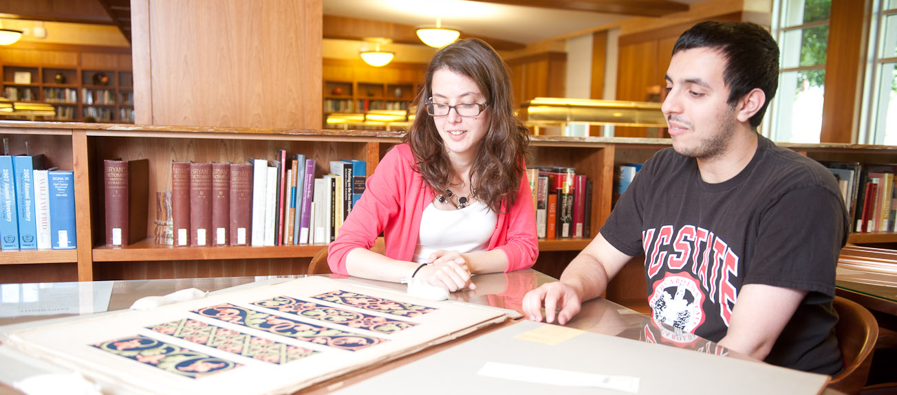 Students reading in the DH Hill Library reading room